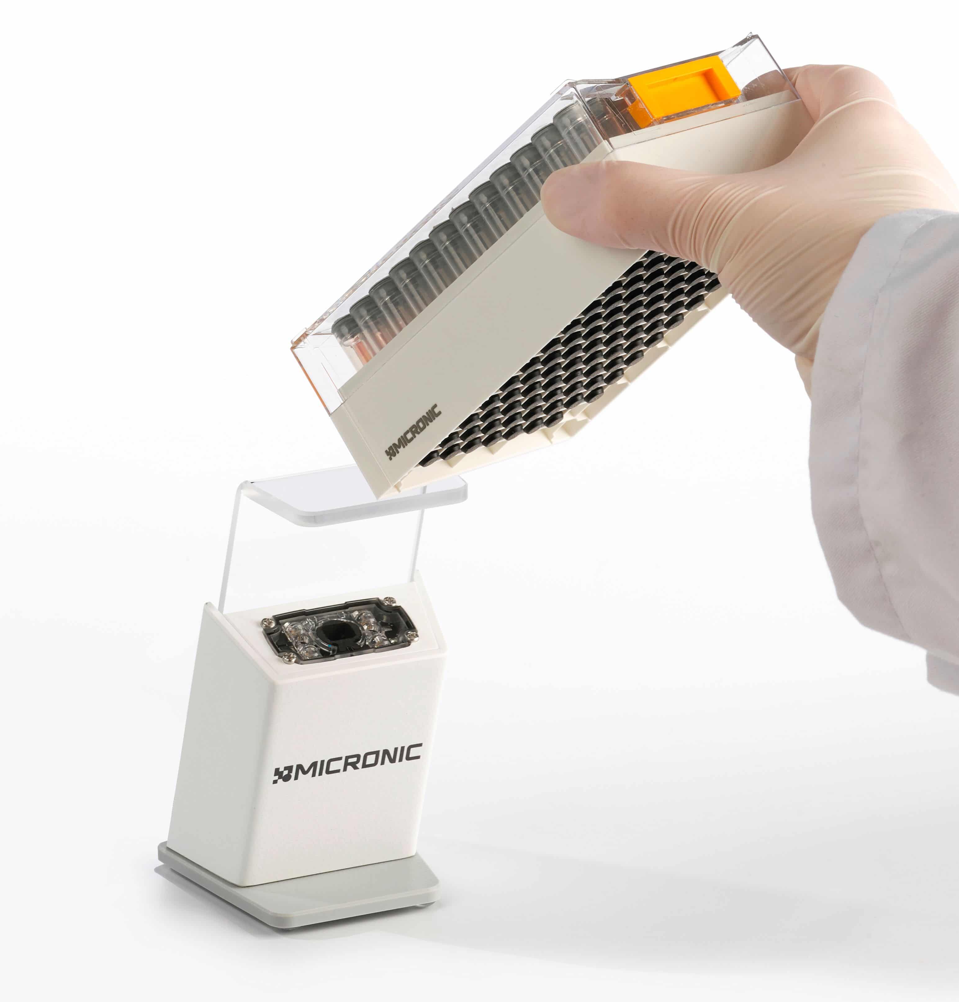 The Micronic tube reader DT500 being used to scan the 1D barcode on a Micronic hybrid tube