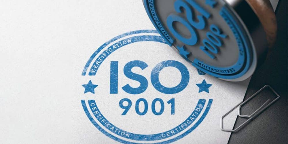 Picture of a stamp with ISO 9001 on it